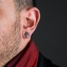 M`s Collection silver pierces with black zirconia on male model. 